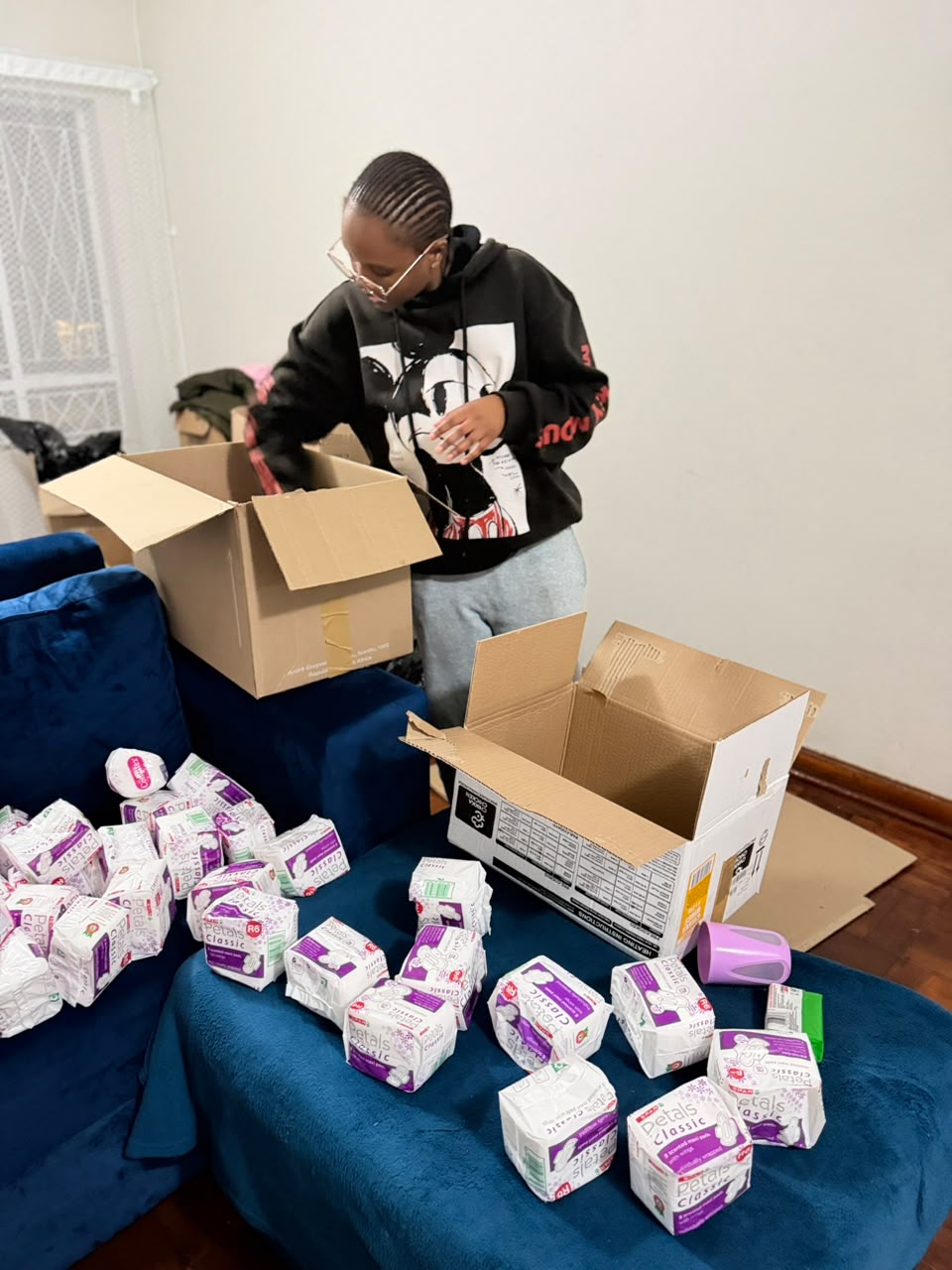Sanitary pad packs prepared for a school dignity drive
